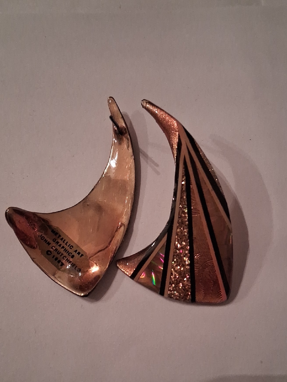 Vintage 1987 John Crutchfield boomerang earrings.